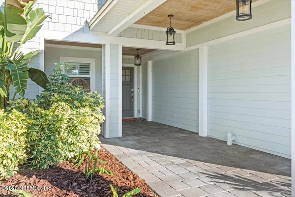 a view of a back yard of the house