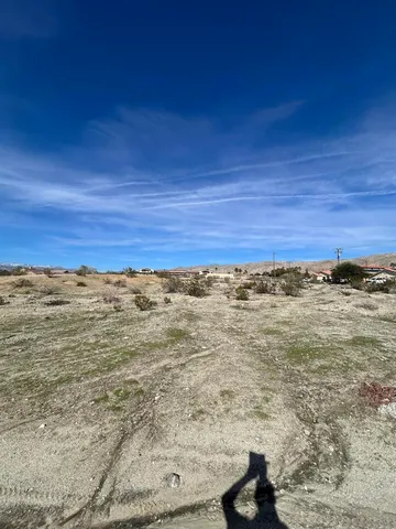 a view of a sky from a corridor