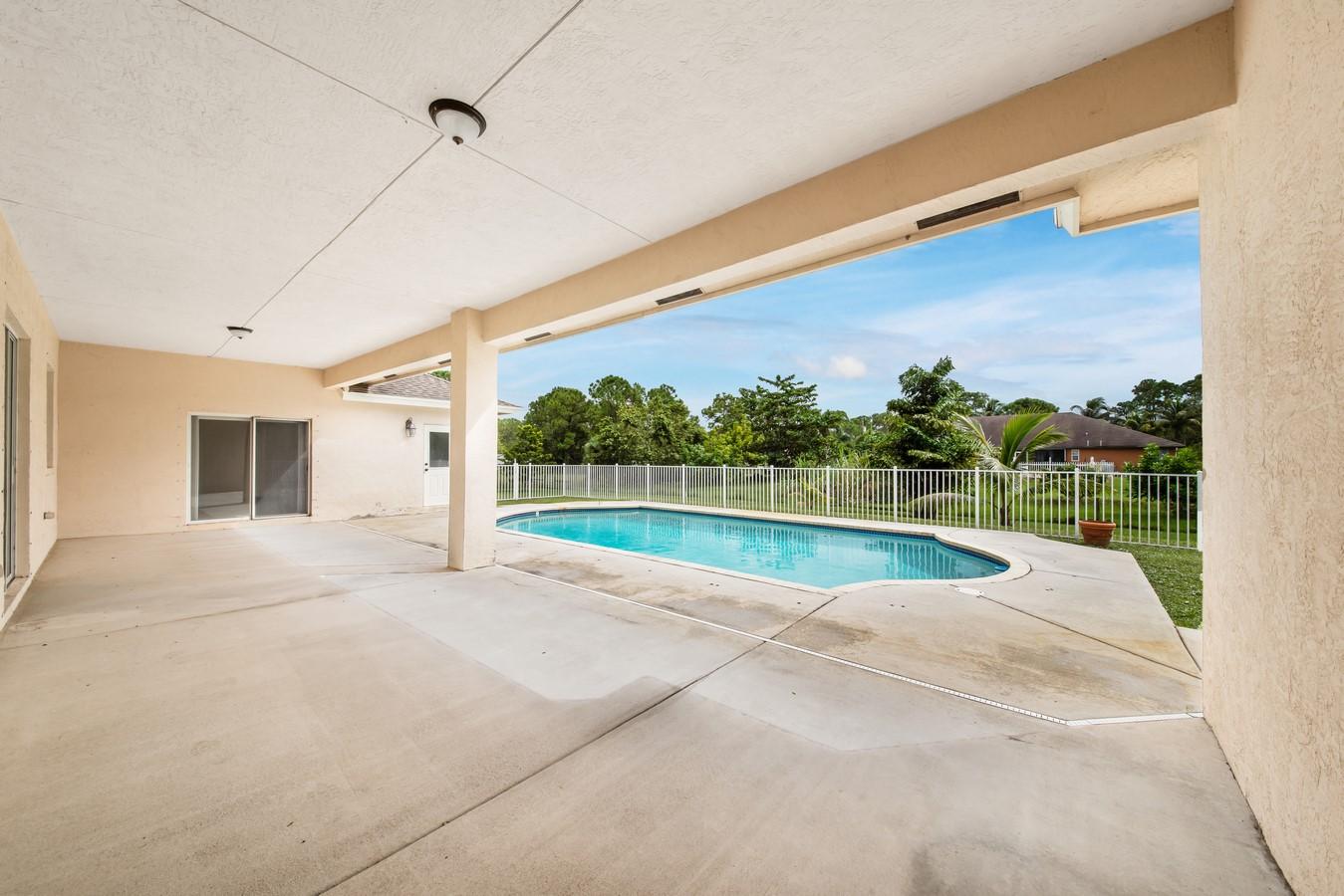 14330 77th Place North Loxahatchee, FL 33470 - Photo 37 of 54 Covered Patio