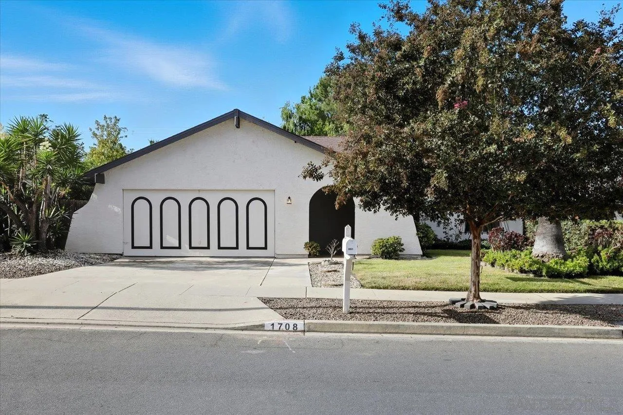 1708 Woodbridge Road Escondido, CA 92026 - Photo 2 of 38 a view of street along with house and trees