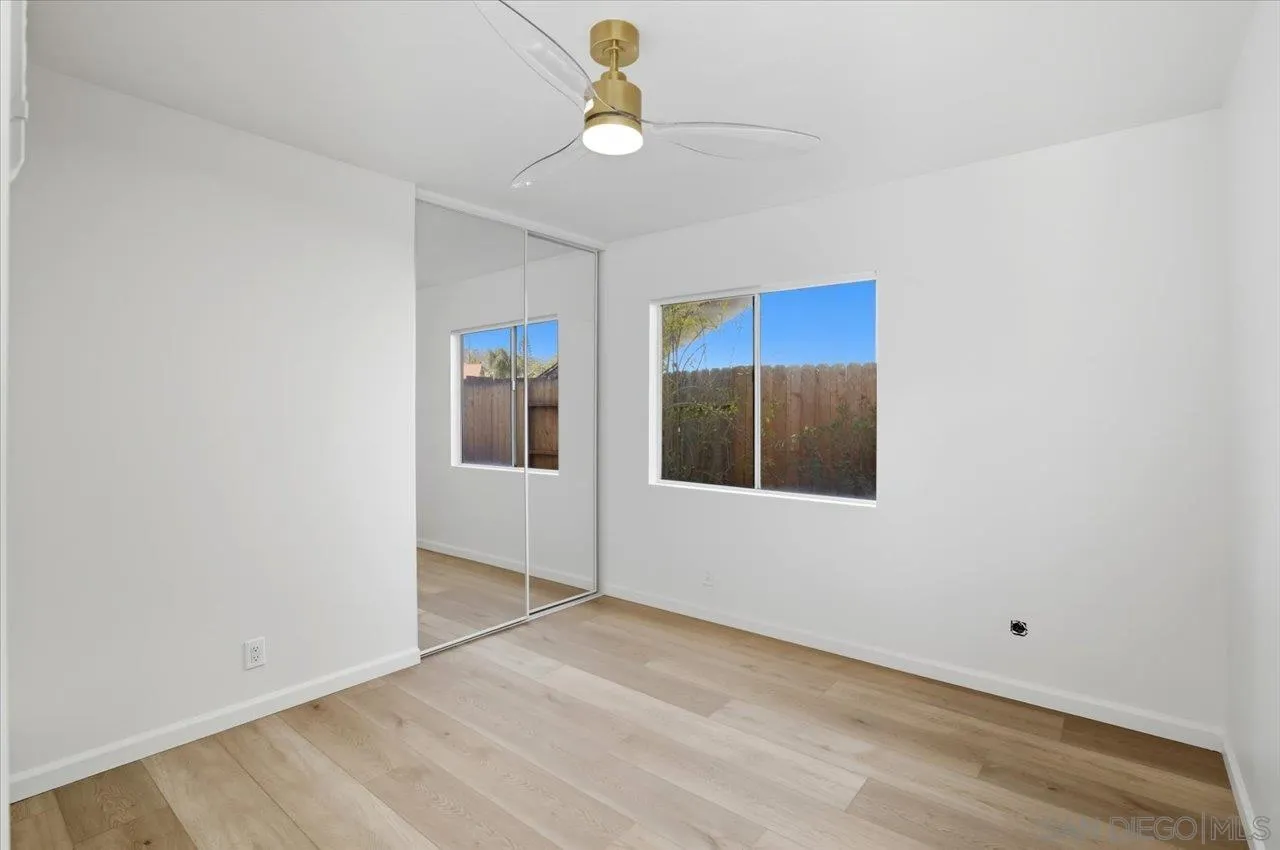 1708 Woodbridge Road Escondido, CA 92026 - Photo 28 of 38 a view of an empty room with chandelier fan