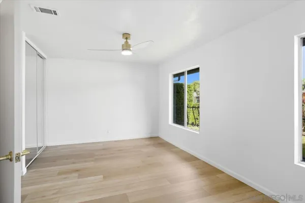 an empty room with windows