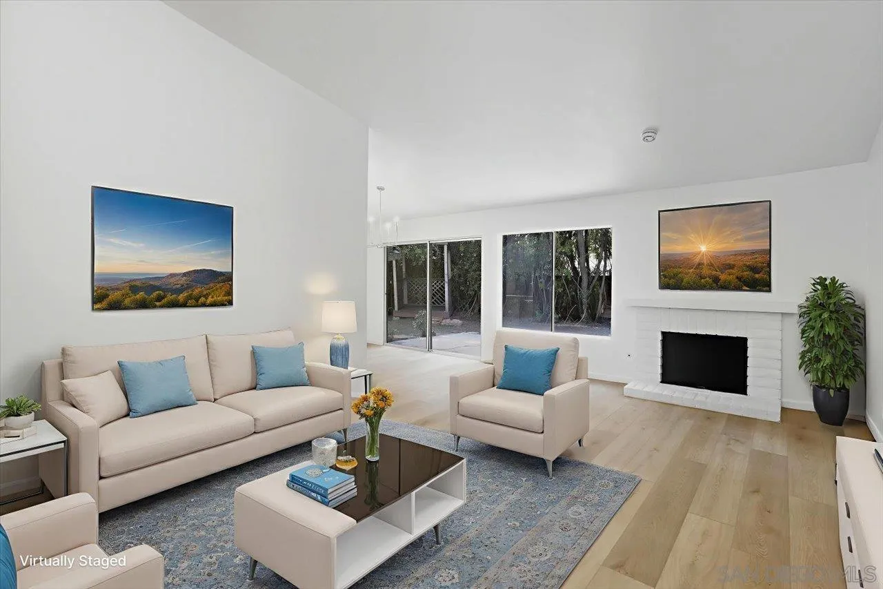 1708 Woodbridge Road Escondido, CA 92026 - Photo 5 of 38 a living room with furniture and a fireplace