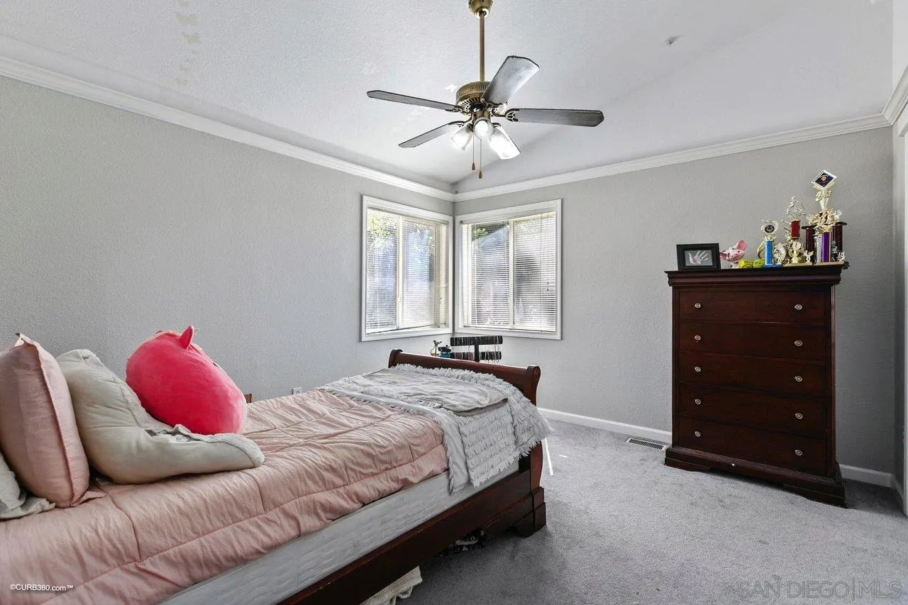 8622 Gardena Road Lakeside, CA 92040 - Photo 17 of 29 a bedroom with a bed and a dresser