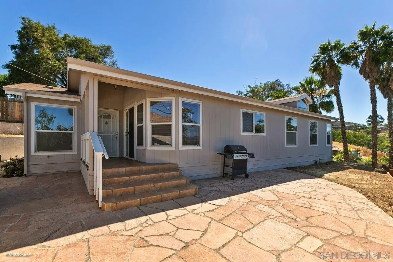 8622 Gardena Road Lakeside, CA 92040 - Photo 25 of 29 a front view of a house with a yard