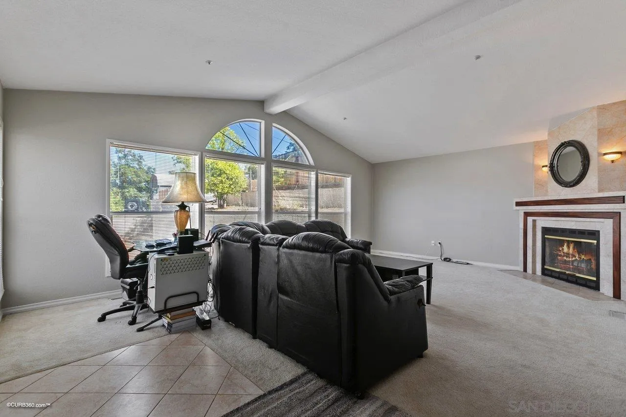 8622 Gardena Road Lakeside, CA 92040 - Photo 5 of 29 a view of a livingroom with furniture and a fireplace