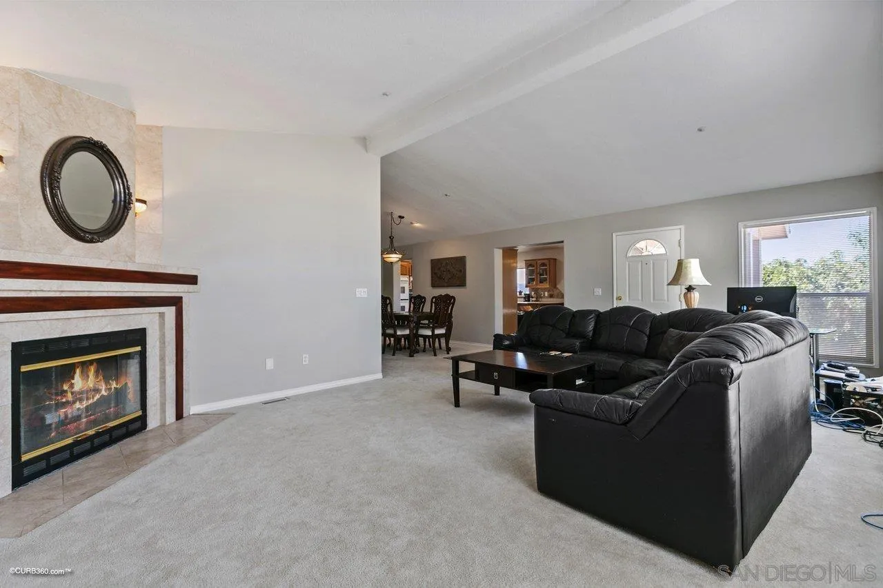 8622 Gardena Road Lakeside, CA 92040 - Photo 7 of 29 a living room with furniture and a fireplace