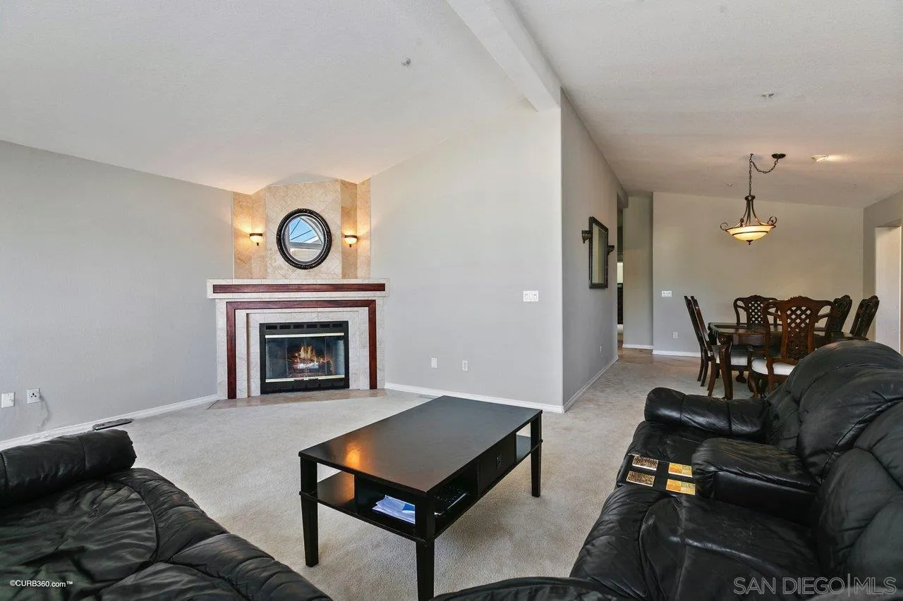 8622 Gardena Road Lakeside, CA 92040 - Photo 8 of 29 a living room with furniture and a fireplace