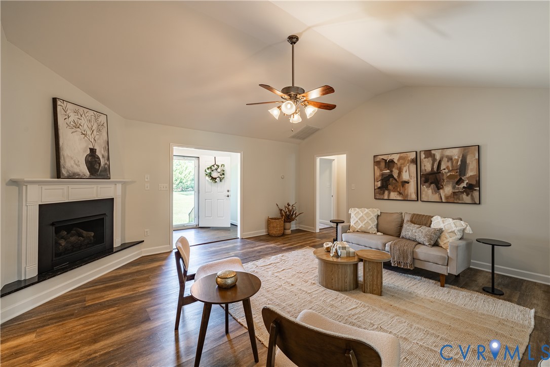 Vaulted ceiling, wood-finish flooring, built-in fi