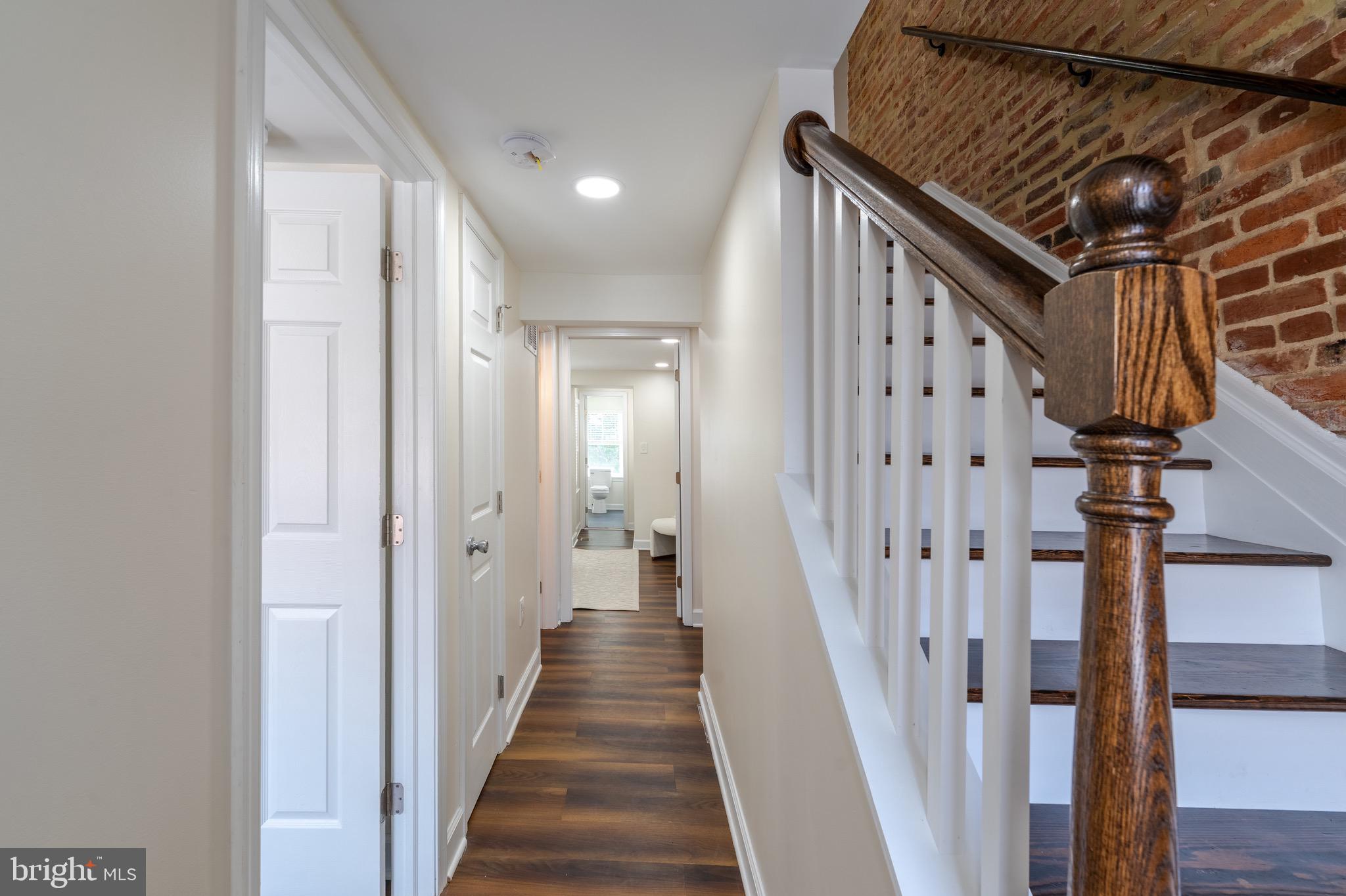 123 East Cross Street Baltimore, MD 21230 - Photo 16 of 33 a view of a hallway with wooden floor and entryway