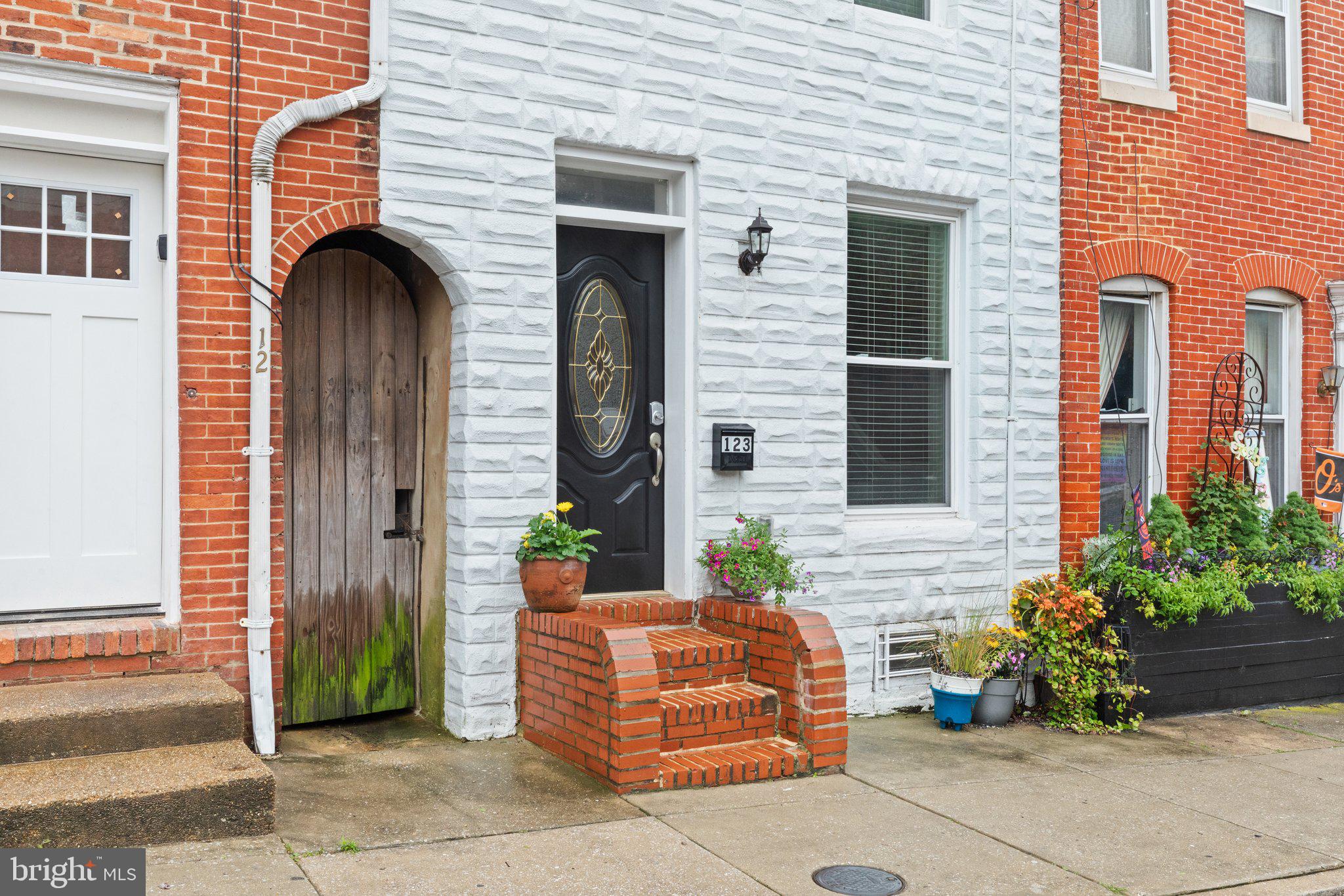 123 East Cross Street Baltimore, MD 21230 - Photo 2 of 33 a front view of a house