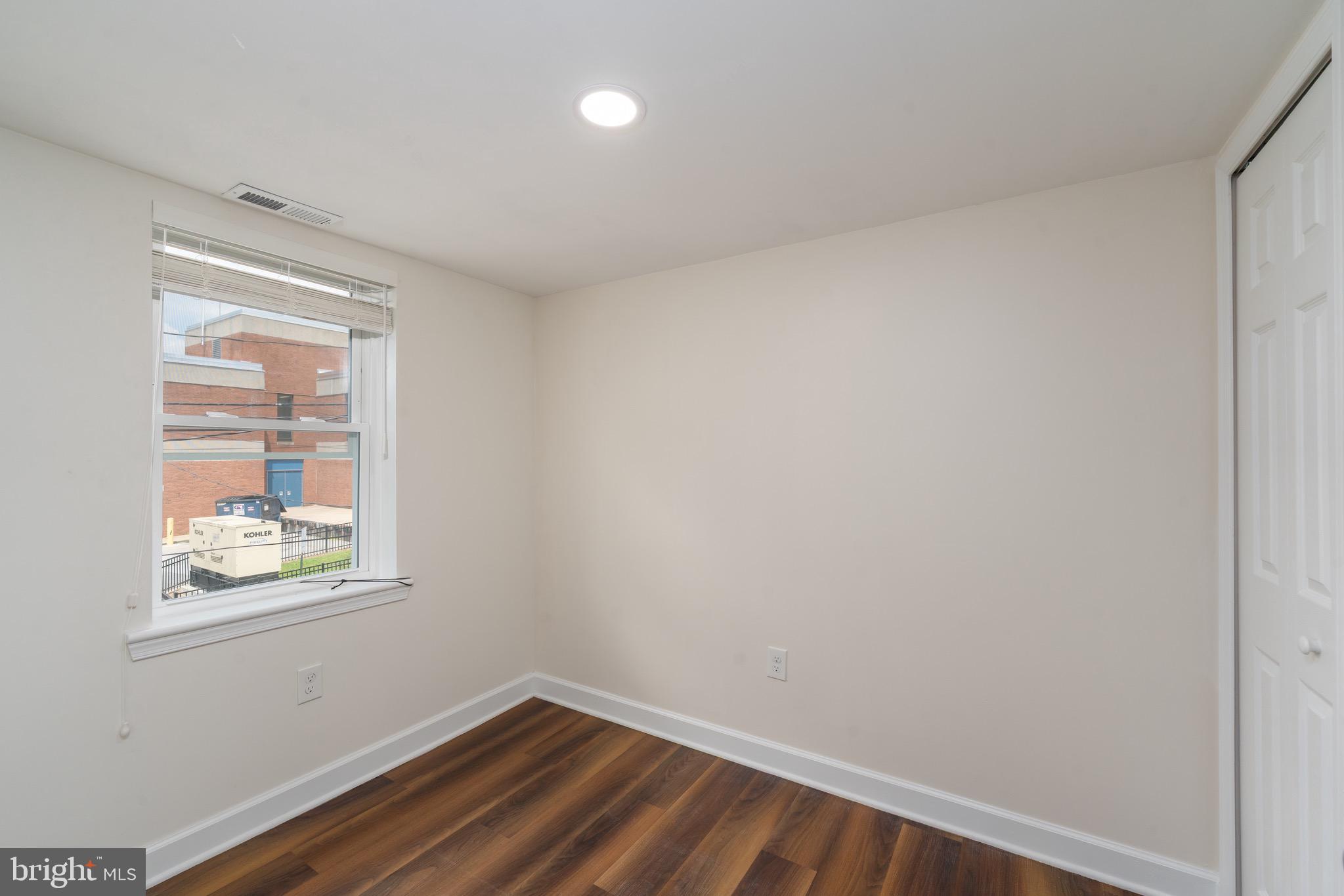 123 East Cross Street Baltimore, MD 21230 - Photo 30 of 33 a room with a window and closet