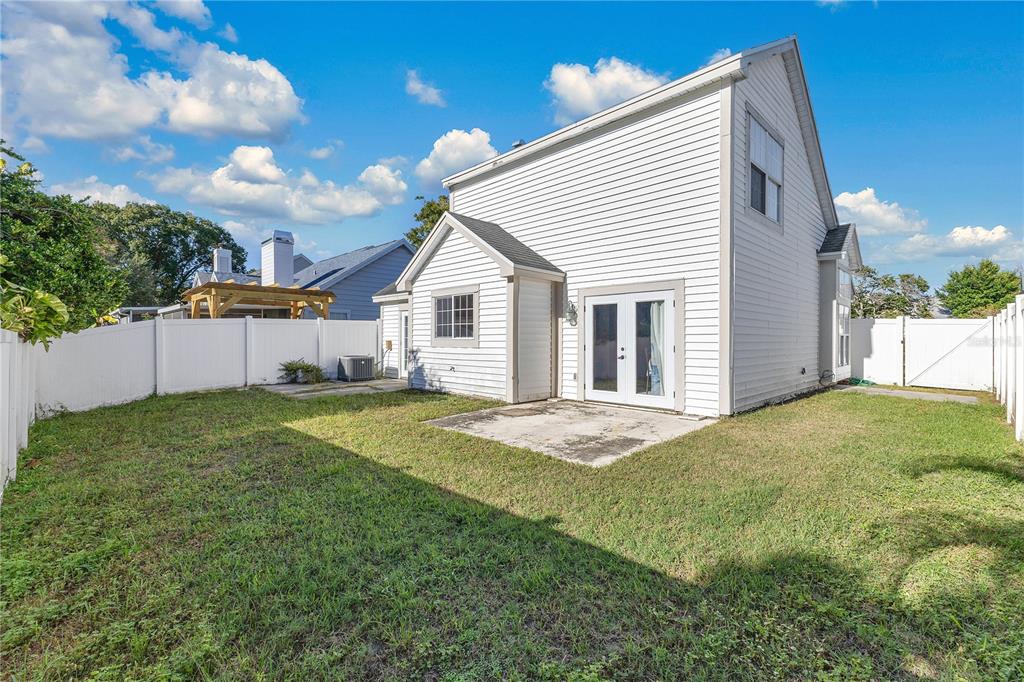 2640 Waymeyer Drive Orlando, FL 32812 - Photo 21 of 33 a view of an house with backyard and garden