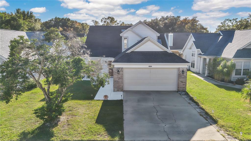 2640 Waymeyer Drive Orlando, FL 32812 - Photo 24 of 33 a aerial view of a house with a yard