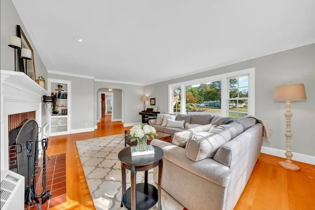 a spacious bathroom with a double vanity sink toilet and a mirror