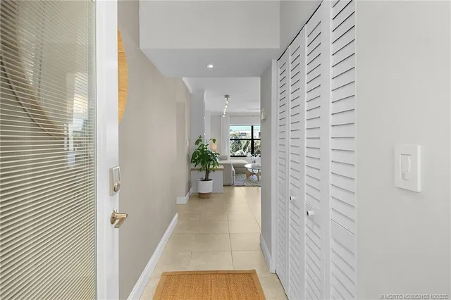 a bathroom with a sink toilet a mirror and shower