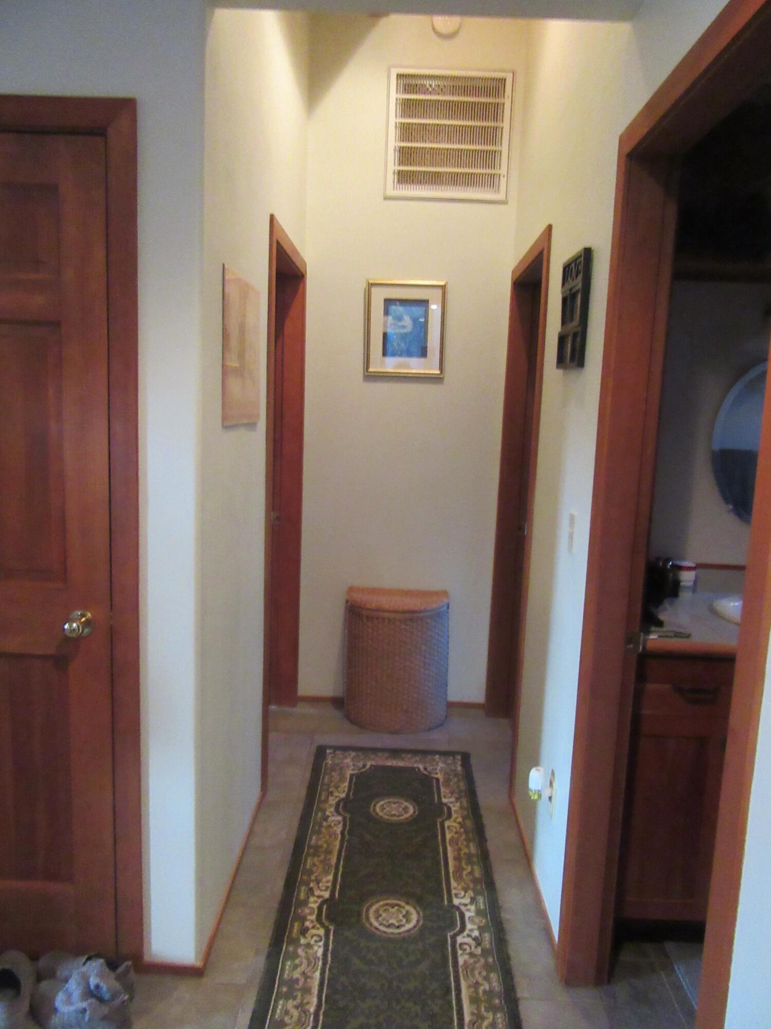 16144 Sprague River Road Chiloquin, OR 97624 - Photo 37 of 81 Downstairs Hallway with skylight