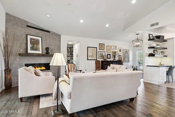 a black and white photo of a living room