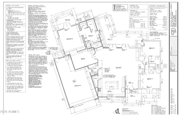 a kitchen with granite countertop a sink cabinets and wooden floor
