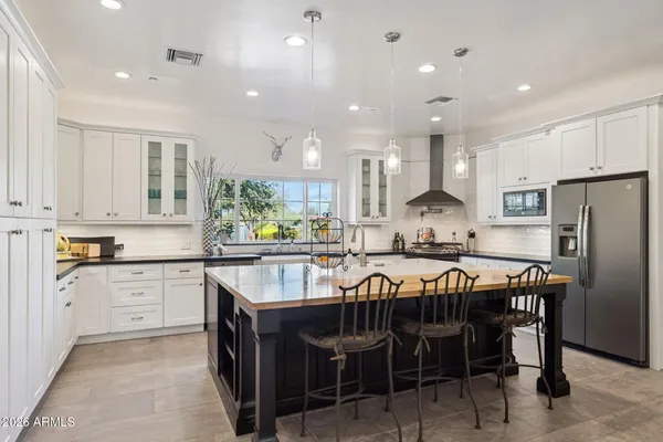 a view of kitchen center island and living room