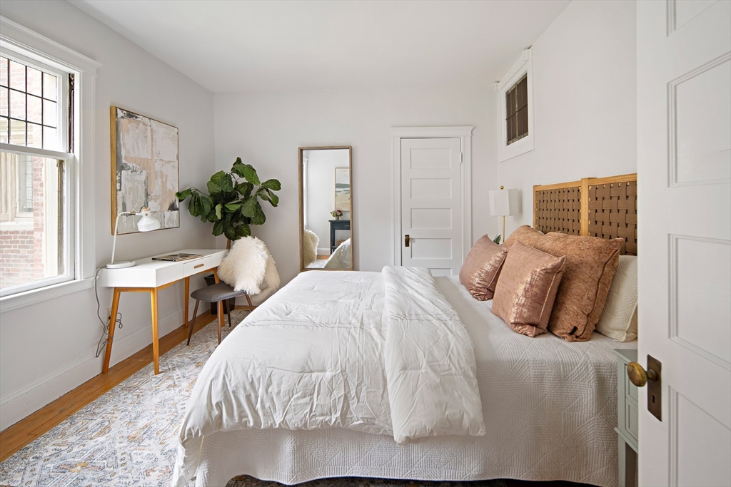 10 Dana Street, Unit 202 Cambridge, MA 02138 - Photo 9 of 16 a bedroom with bed and a window