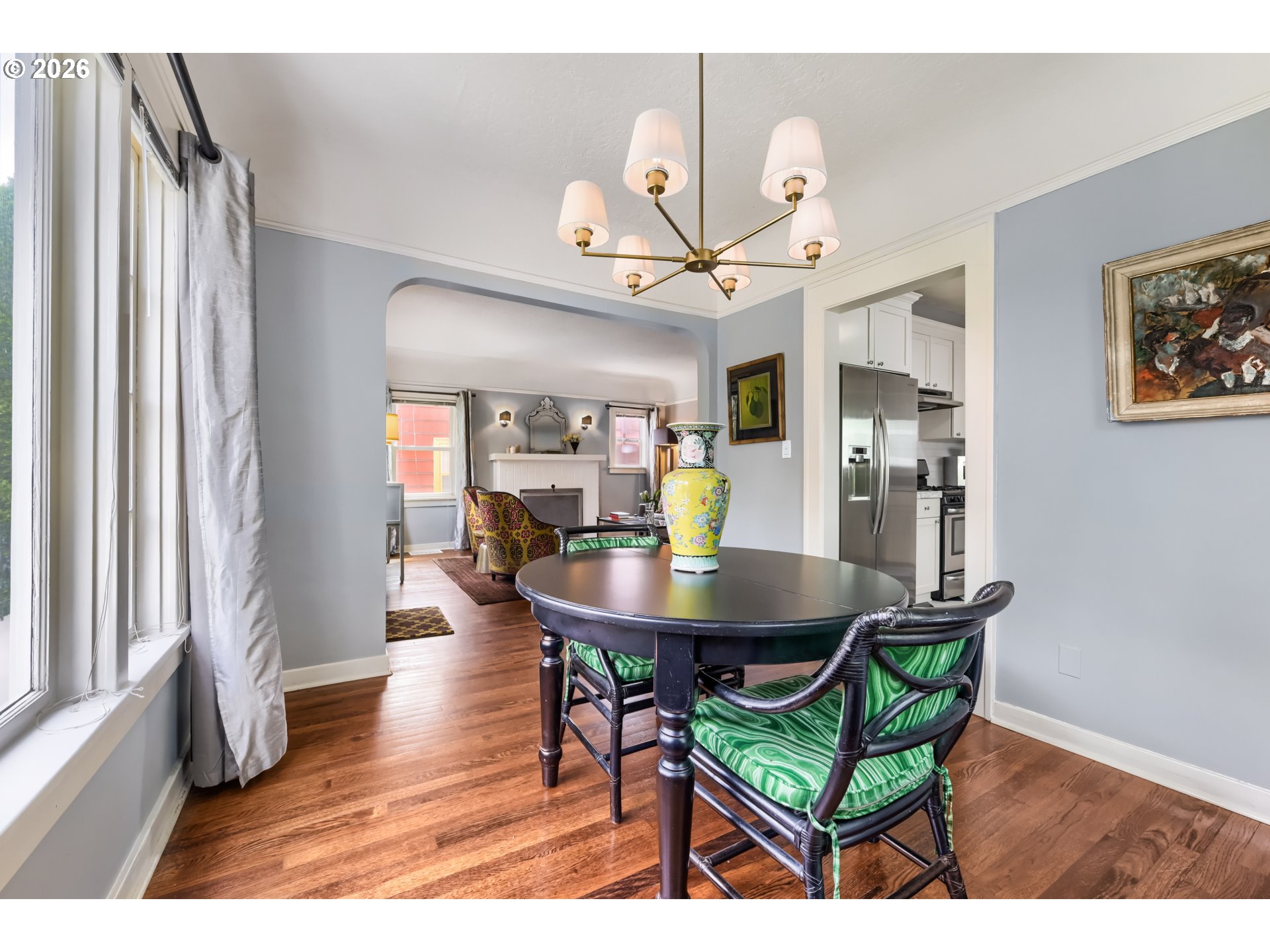 5812 Southeast Bush Street Portland, OR 97206 - Photo 12 of 27 a view of a dining room with furniture and wooden floor
