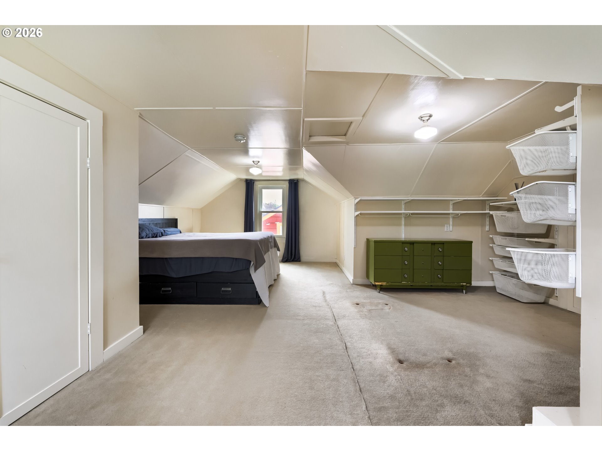 5812 Southeast Bush Street Portland, OR 97206 - Photo 18 of 27 a room with furniture and a lamp