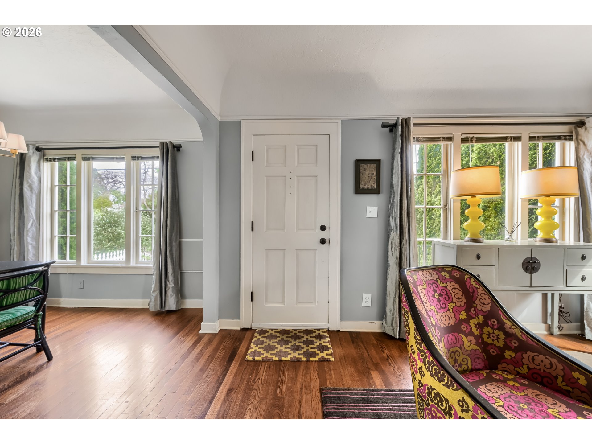 5812 Southeast Bush Street Portland, OR 97206 - Photo 6 of 27 a living room with furniture and a wooden floor