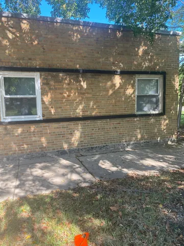 a view of a house with a lake view