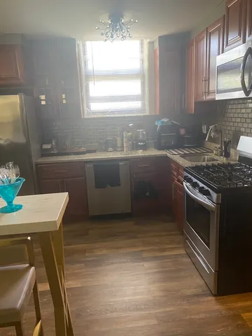 a view of a yard with an outdoor space