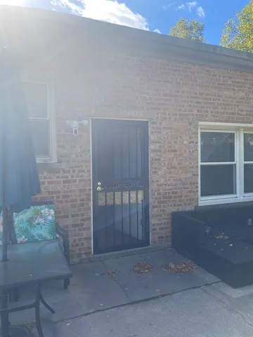 a view of backyard of a house