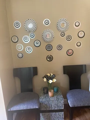 a view of a workspace with furniture