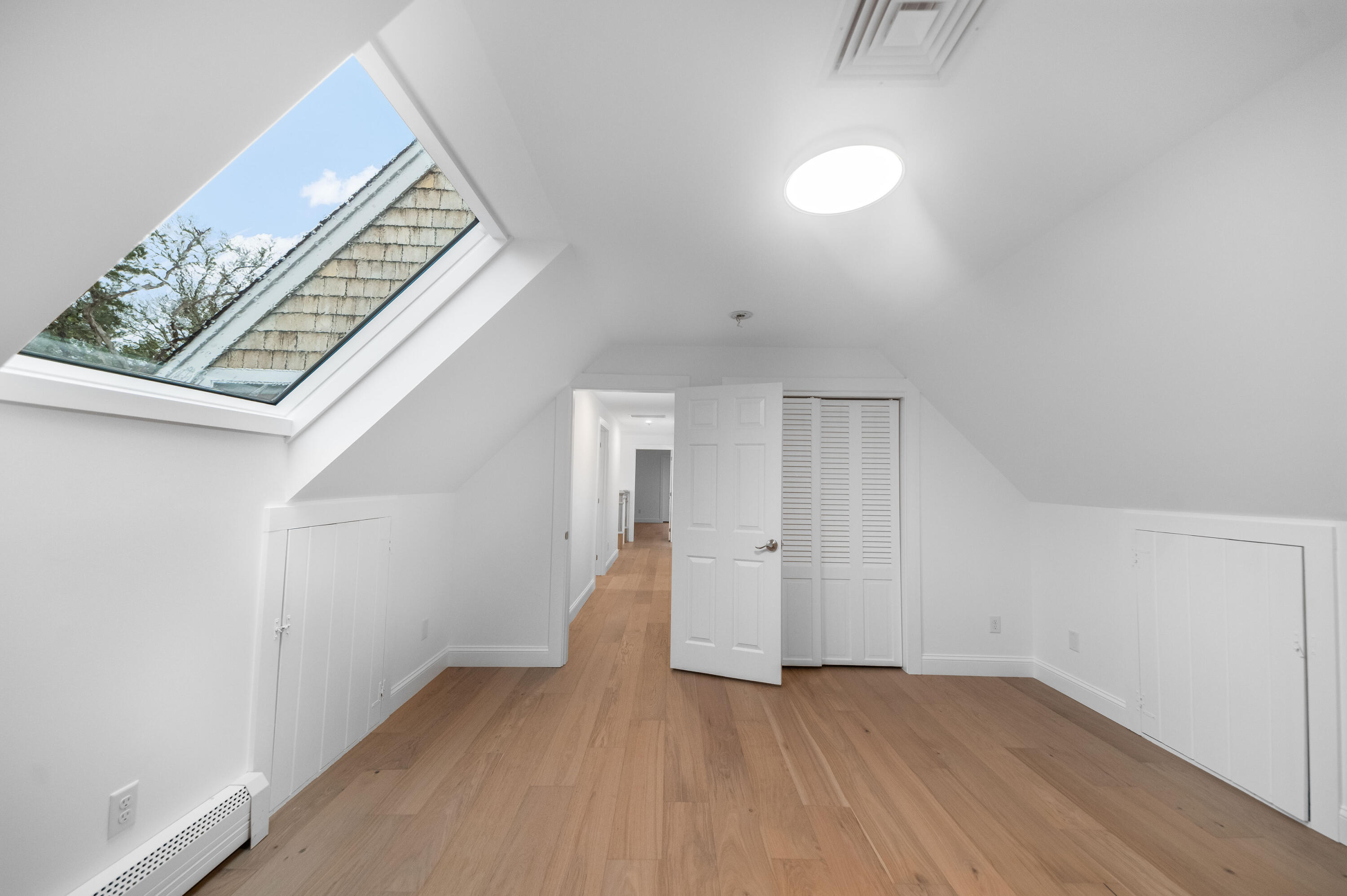 3 Sheayer Road Harwich, MA 02645 - Photo 24 of 38 an empty room with wooden floor and windows