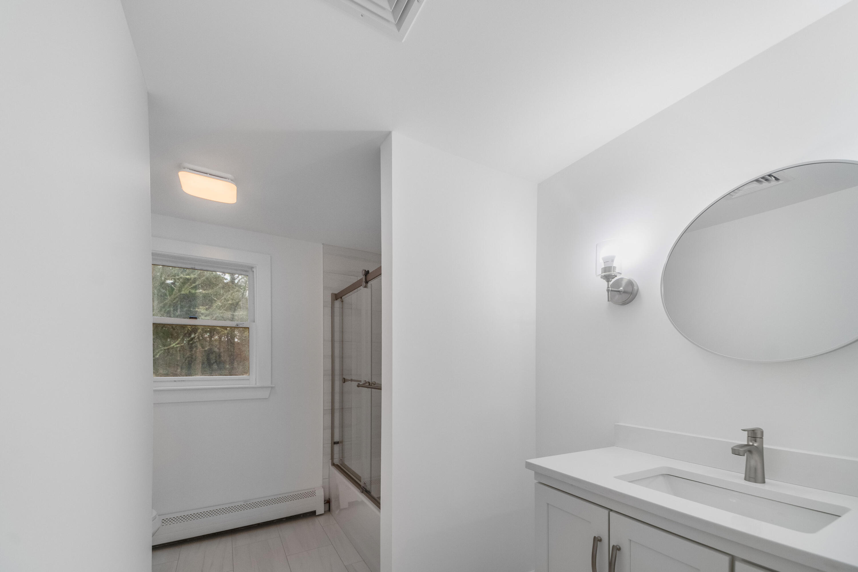 3 Sheayer Road Harwich, MA 02645 - Photo 26 of 38 a bathroom with a sink and a mirror