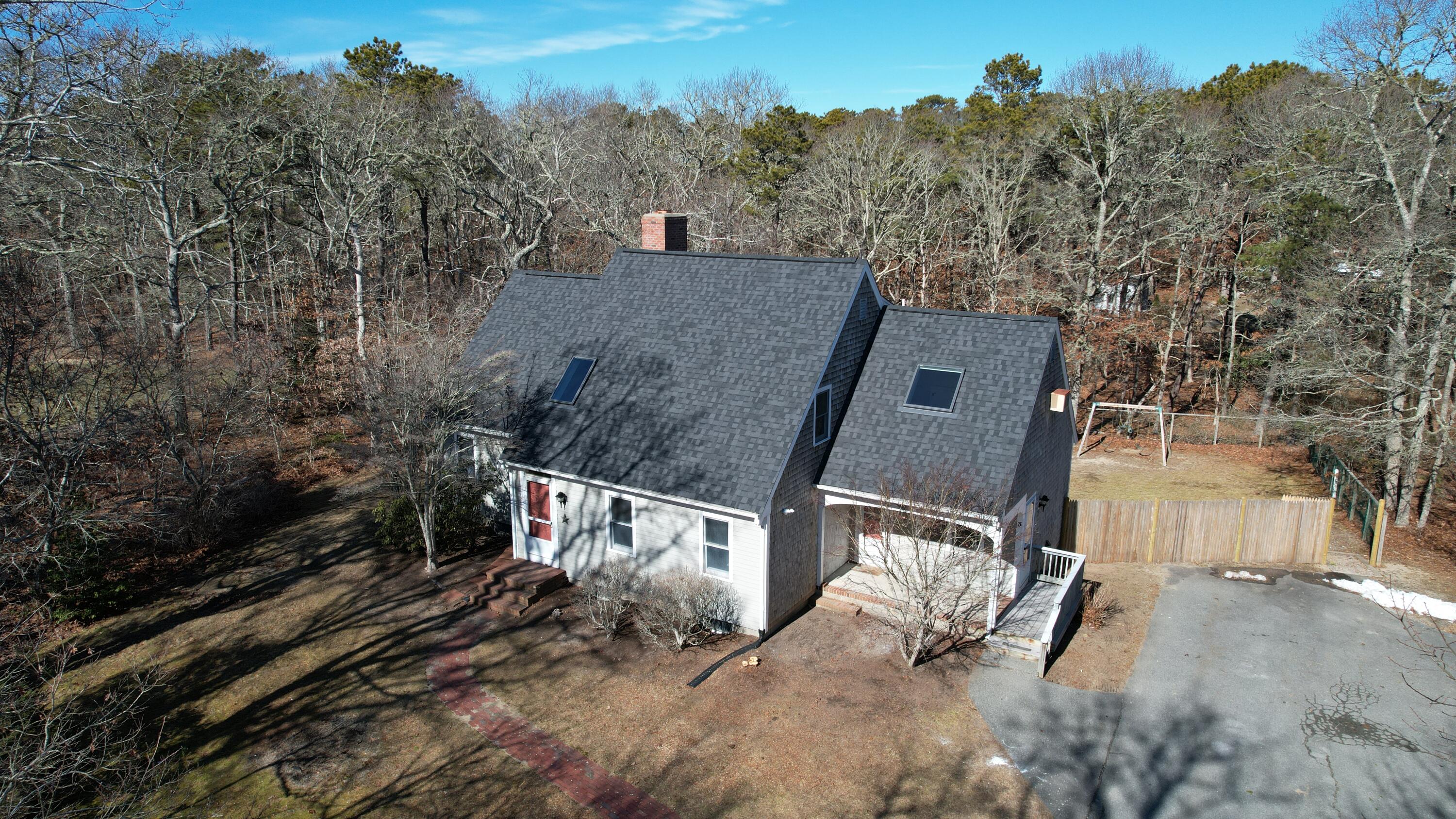 3 Sheayer Road Harwich, MA 02645 - Photo 3 of 38 an aerial view of a house with a yard