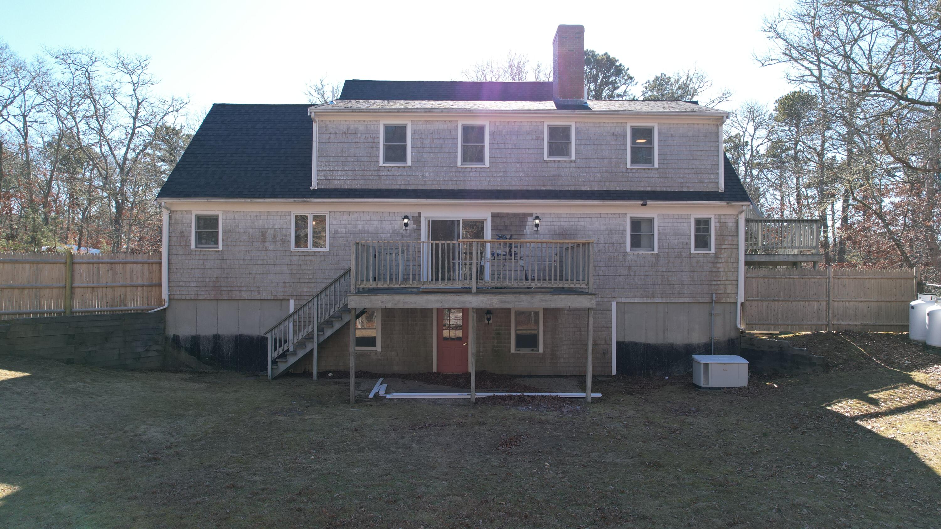 3 Sheayer Road Harwich, MA 02645 - Photo 35 of 38 a view of a house with a yard