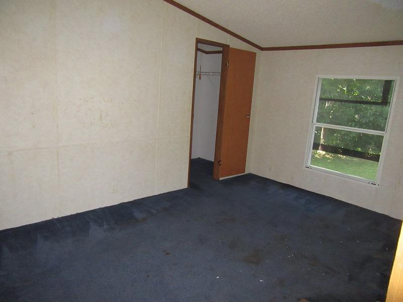 2153 Broome Road Palmyra, TN 37142 - Photo 10 of 10 an empty room with windows