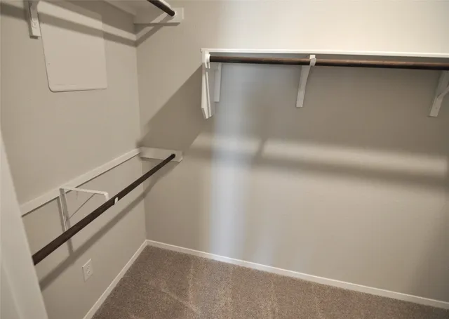 a view of a room with racks on the wall