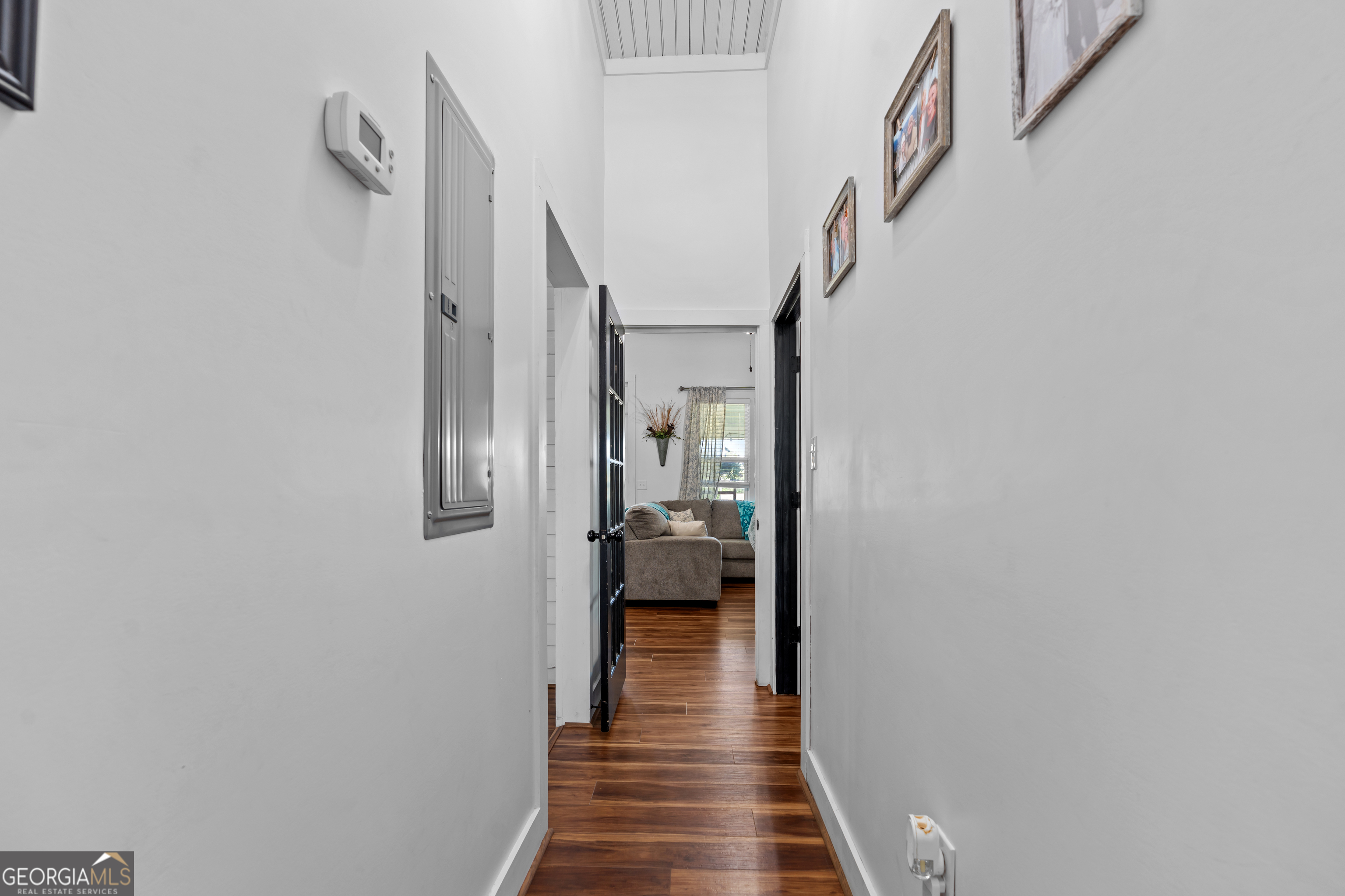 5065 10 Mile Road Baxley, GA 31513 - Photo 16 of 70 a view of a hallway with wooden floor and entryway