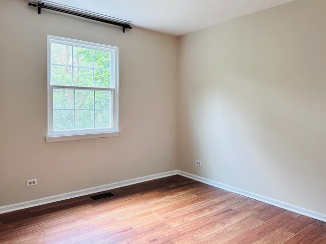 a bathroom with a tub and shower