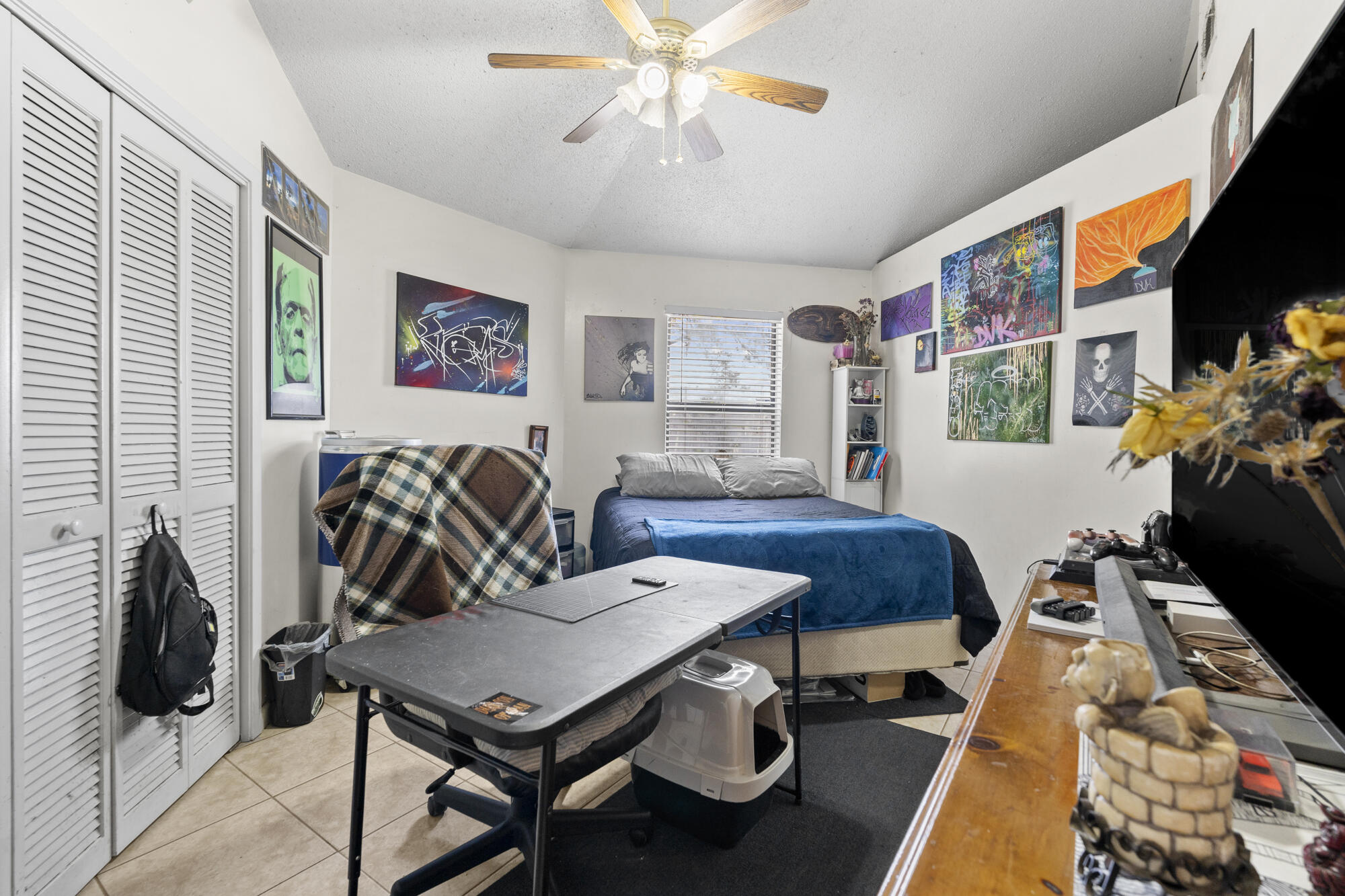 6904 Sea Turtle Circle Navarre, FL 32566 - Photo 12 of 49 a living room with furniture a rug and a window