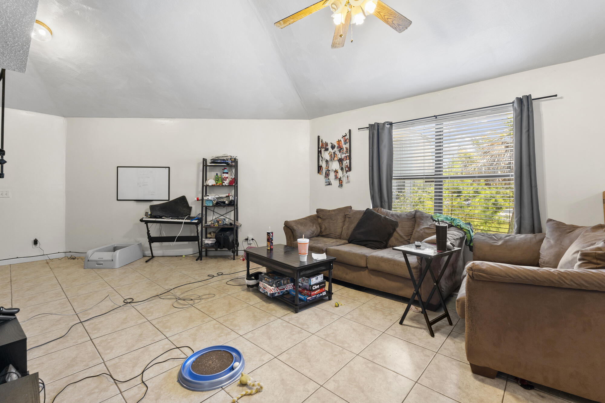 6904 Sea Turtle Circle Navarre, FL 32566 - Photo 24 of 49 a living room with furniture and a large window