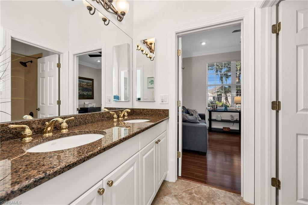 12080 Wicklow Lane Naples, FL 34120 - Photo 22 of 36 Jack and jill bathroom connects to den
