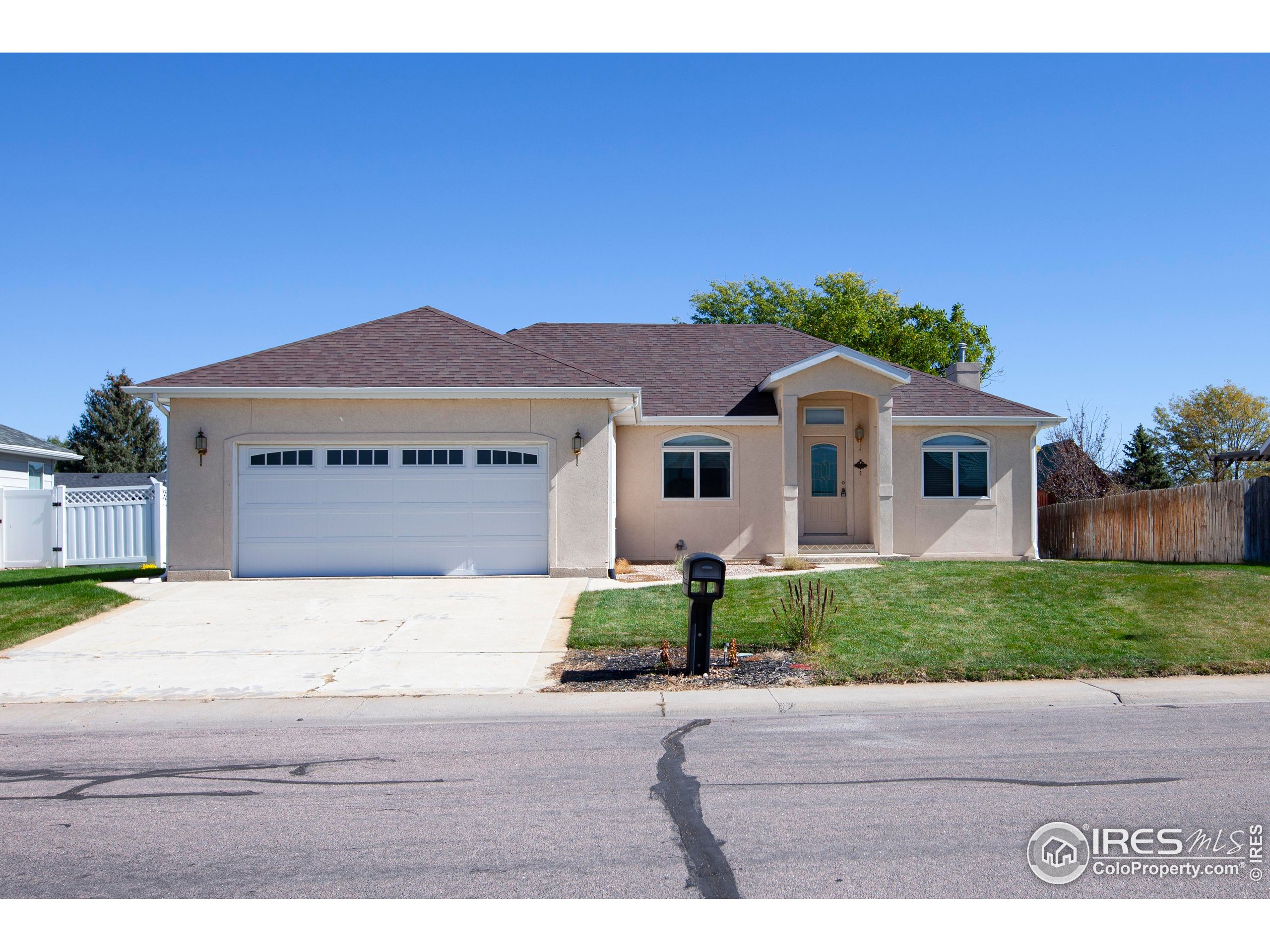 a house view with a garden space