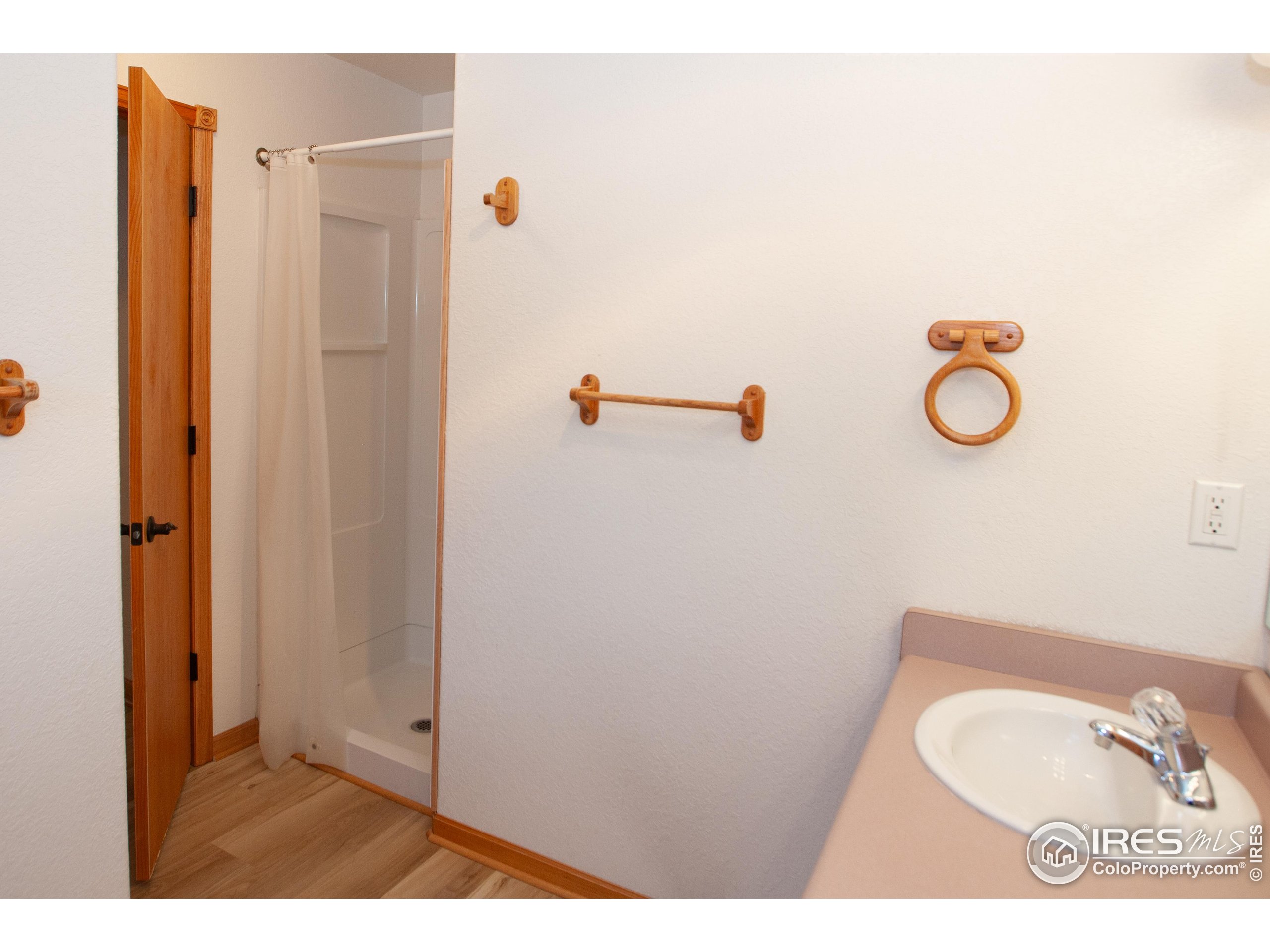 1815 Robin Road Sterling, CO 80751 - Photo 20 of 45 a bathroom with a shower