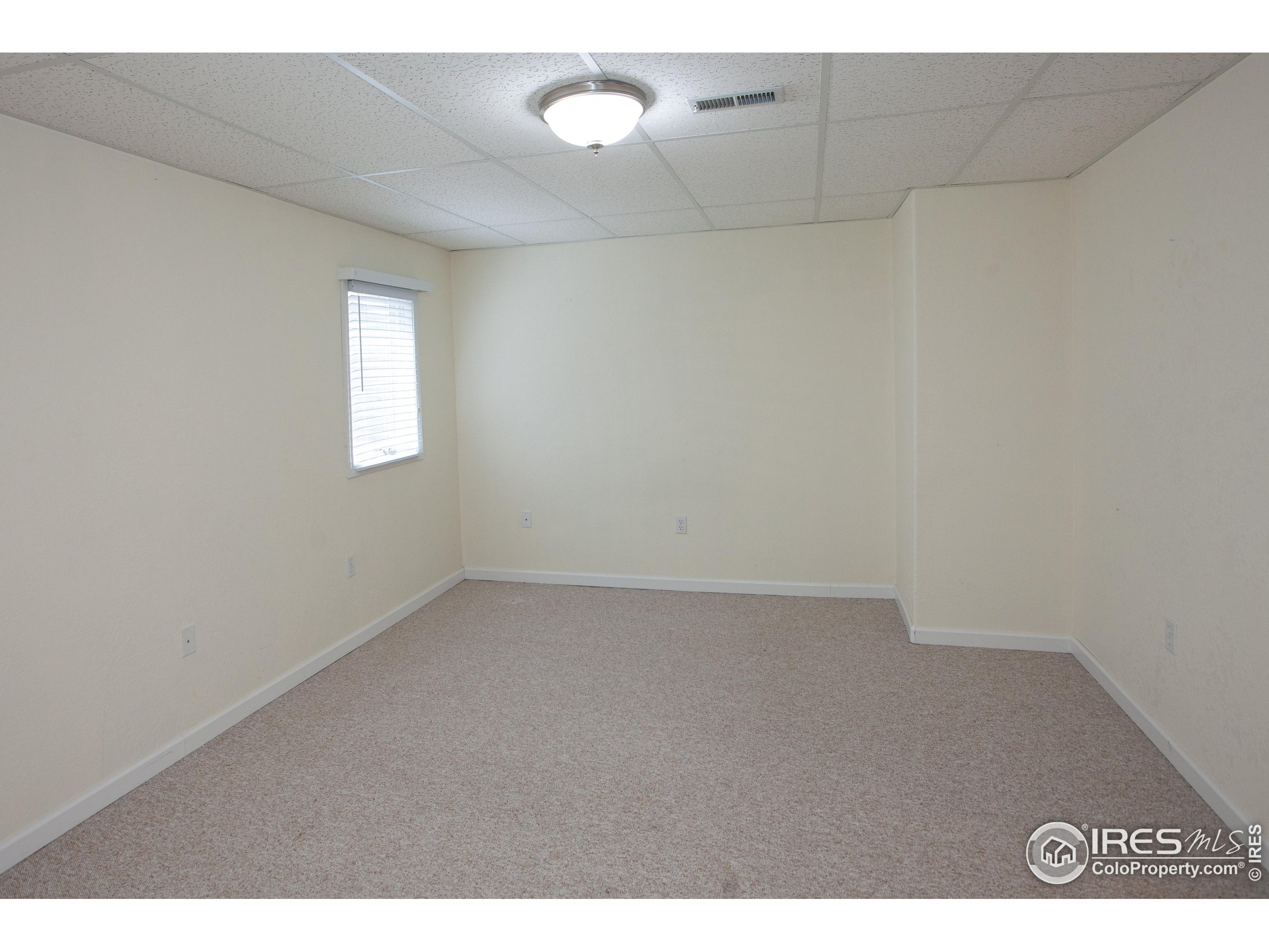 1815 Robin Road Sterling, CO 80751 - Photo 35 of 45 a view of an empty room and window