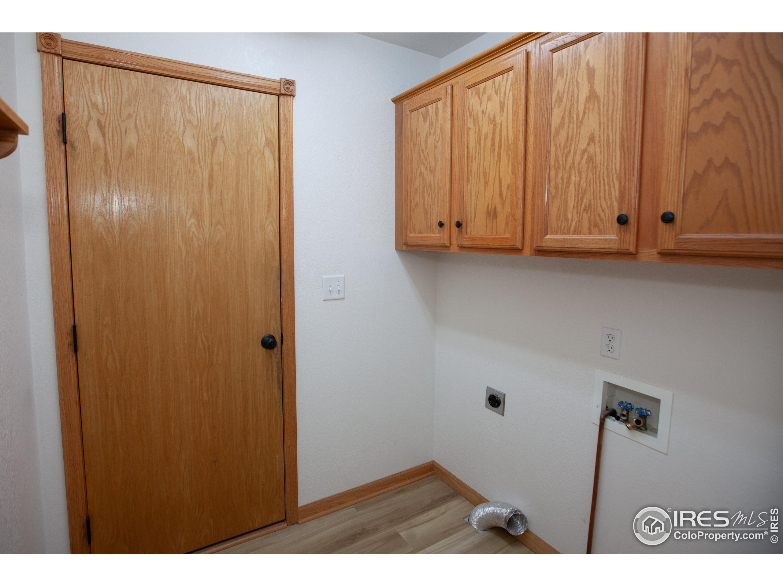 1815 Robin Road Sterling, CO 80751 - Photo 36 of 45 a view of room with wooden walls
