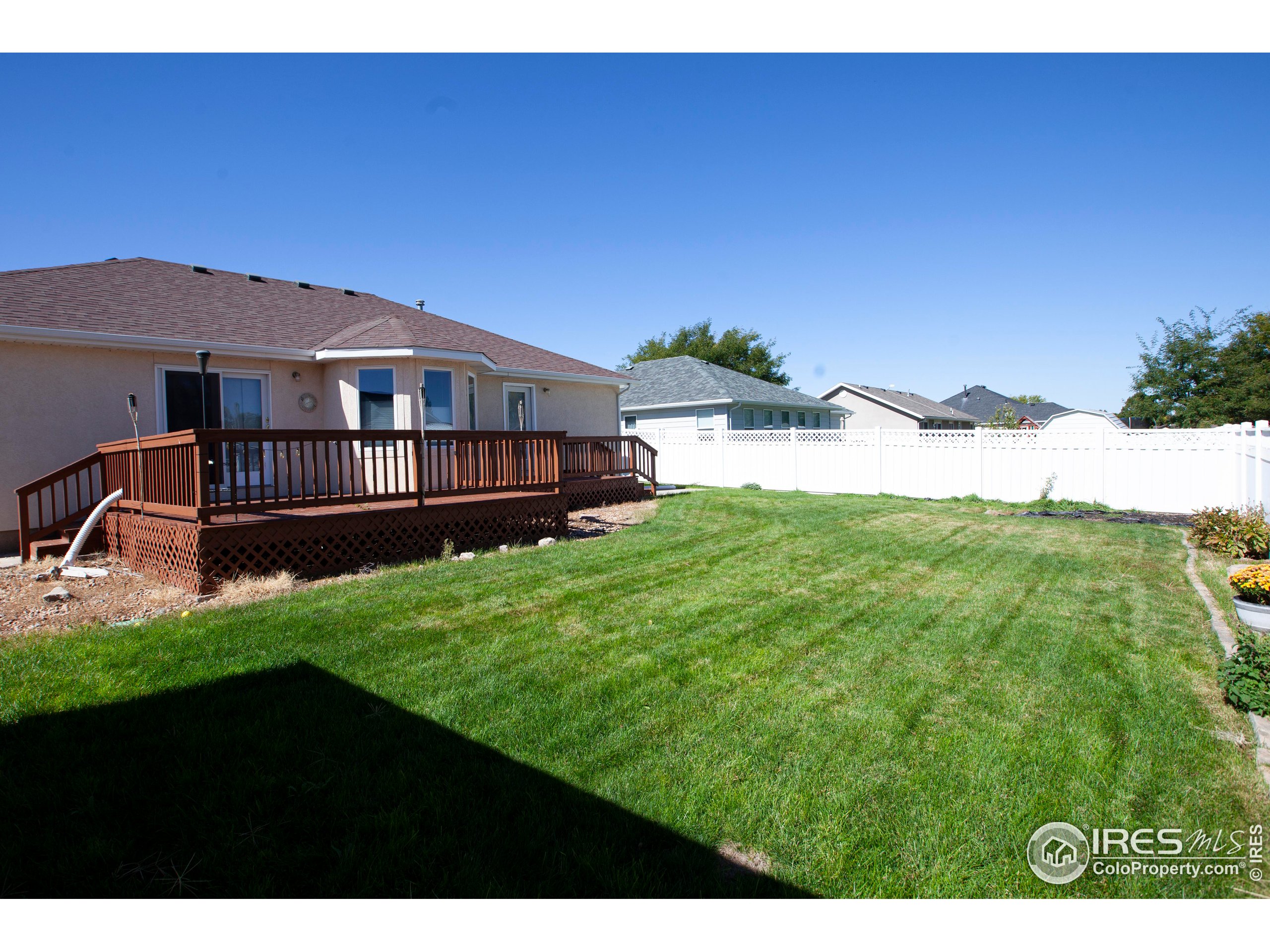1815 Robin Road Sterling, CO 80751 - Photo 42 of 45 a view of a house with a yard