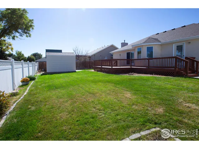 a view of a backyard with a garden