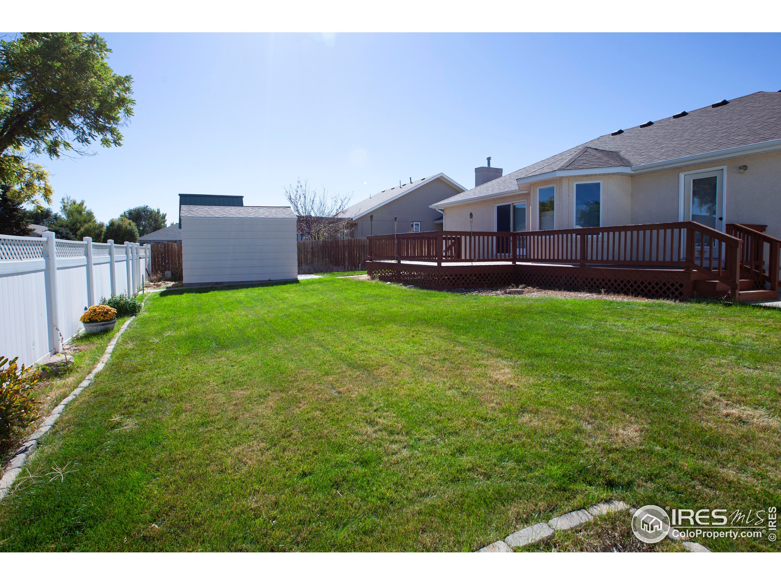 1815 Robin Road Sterling, CO 80751 - Photo 43 of 45 a house view with a garden space